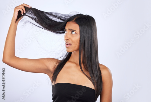 Foto Hair damage, breakage and shock of a frustrated woman isolated on a white background in studio