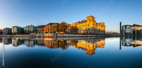 Reichstag with reflection in Spree, Berlin