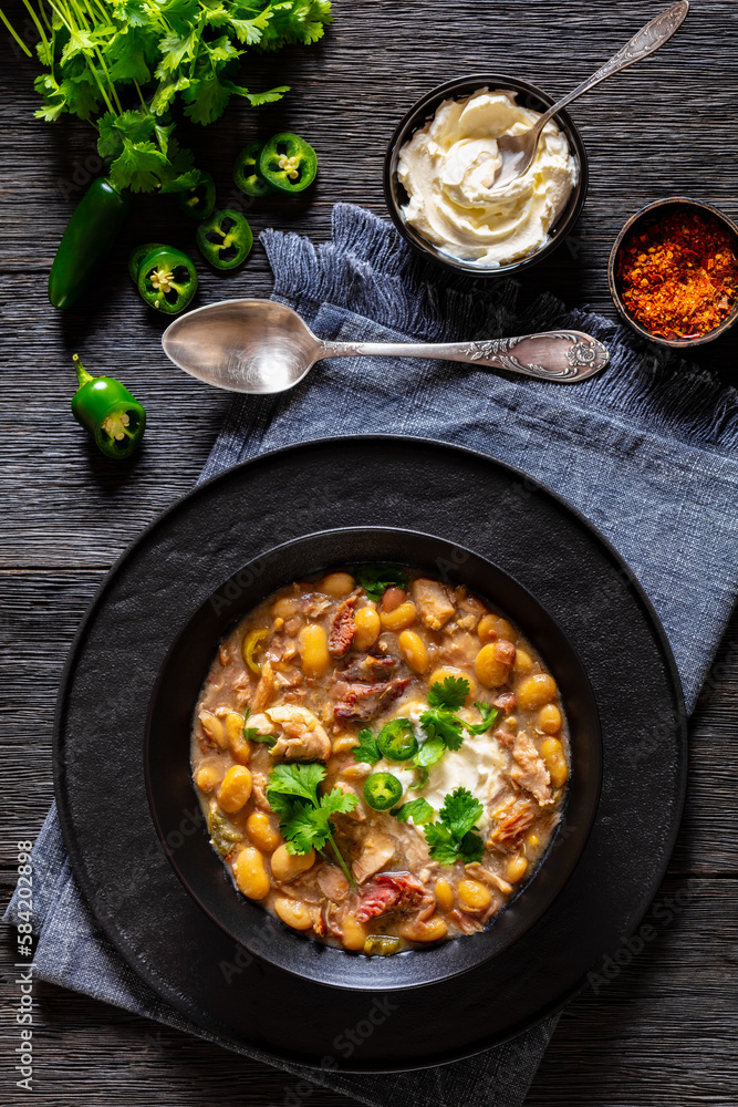 smoked ham hock chicken chili in a bowl smoked ham hock chicken chili in a bowl