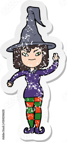 distressed sticker of a cartoon witch