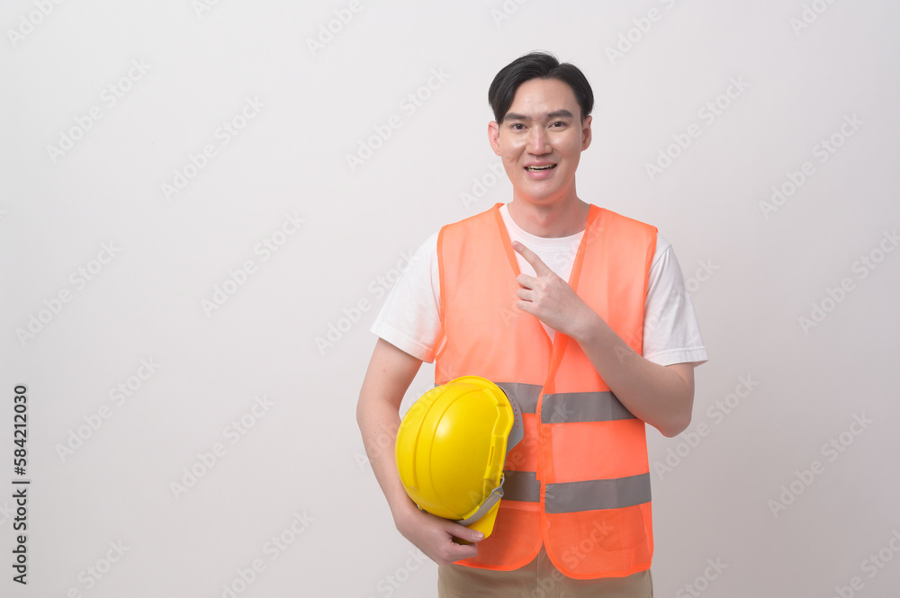 Portrait of male engineer wearing a protective helmet over white background studio. Portrait of male engineer wearing a protective helmet over white background studio.