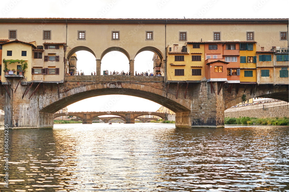 Obraz premium Ponte Vecchio seen from a boat on the Arno River in Florence, Tuscany, Italy