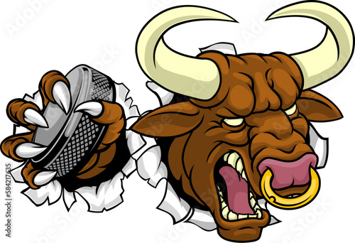 A bull or Minotaur monster longhorn cow angry mean ice hockey mascot cartoon character. photo