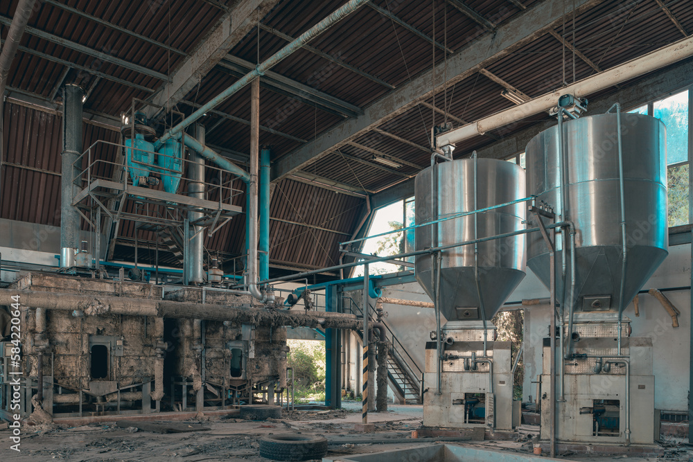 interiors and machinery, plants retaking possession of a disused abandoned industry, former cotton mill, industrial production interiors and machinery, plants retaking possession of a disused abandoned industry, former cotton mill, industrial production