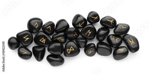 Fotografi Pile of black rune stones isolated on white, top view