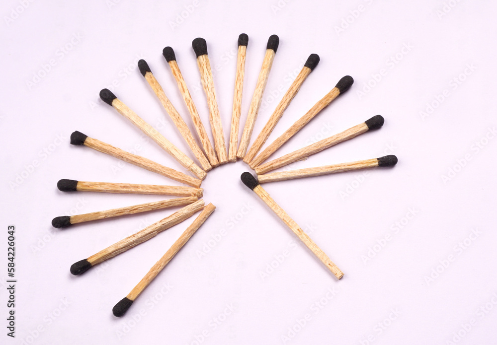 Close-up of a red match isolated on a white background. with clipping path Close-up of a red match isolated on a white background. with clipping path