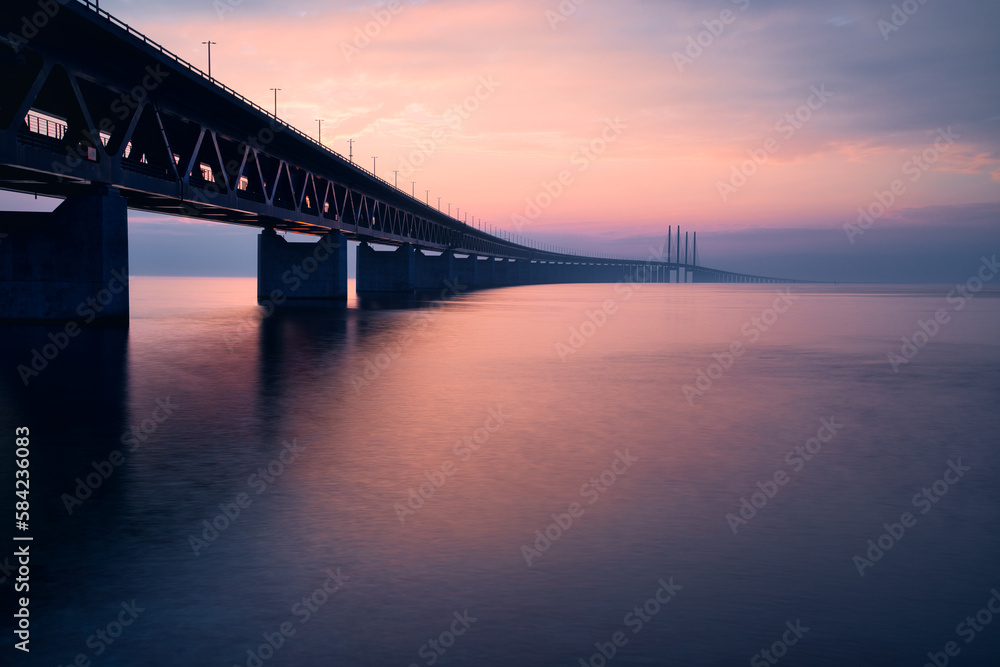 The Oresund Bridge is a combined motorway and railway bridge between Sweden and Denmark (Malmo and Copenhagen). The Oresund Bridge is a combined motorway and railway bridge between Sweden and Denmark (Malmo and Copenhagen).