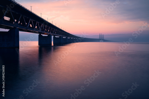 Fototapeta Naklejka Na Ścianę i Meble -  The Oresund Bridge is a combined motorway and railway bridge between Sweden and Denmark (Malmo and Copenhagen).