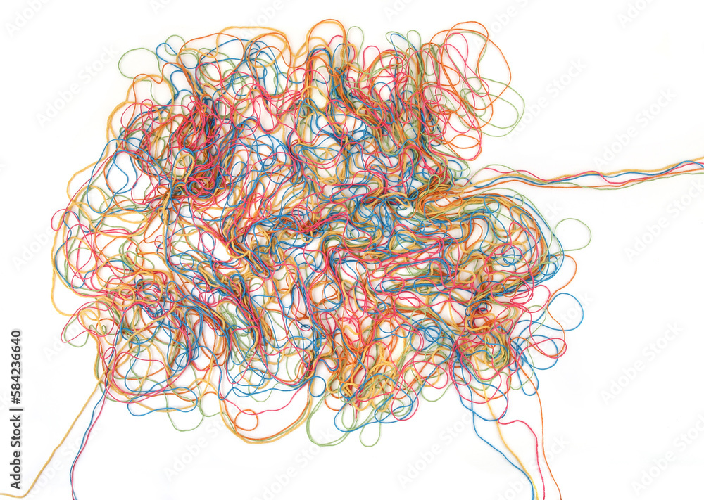 Tangled colorful cotton threads isolated on white background. Abstract thread lines chaos pattern.