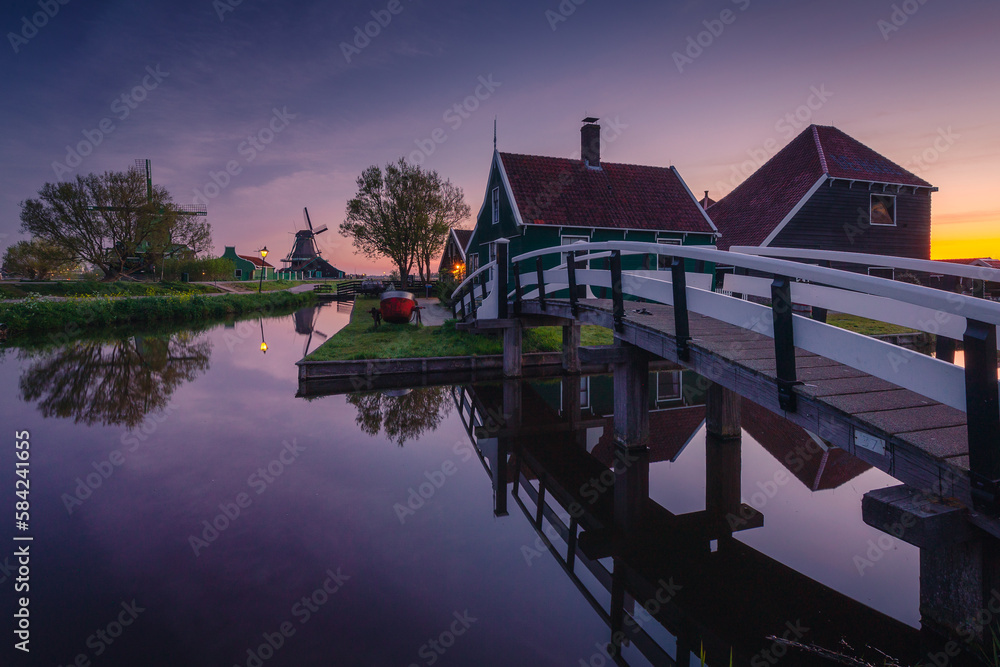 Morning at Zaanse Schans in the Netherlands - it is one of the most beautifully located open-air museums in Europe. Here we will find classic Dutch buildings.