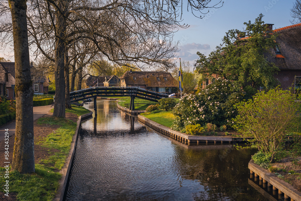 Spring in the village of Giethoorn in North Holland. This town has no roads - it travels through the canals. Spring in the village of Giethoorn in North Holland. This town has no roads - it travels through the canals.