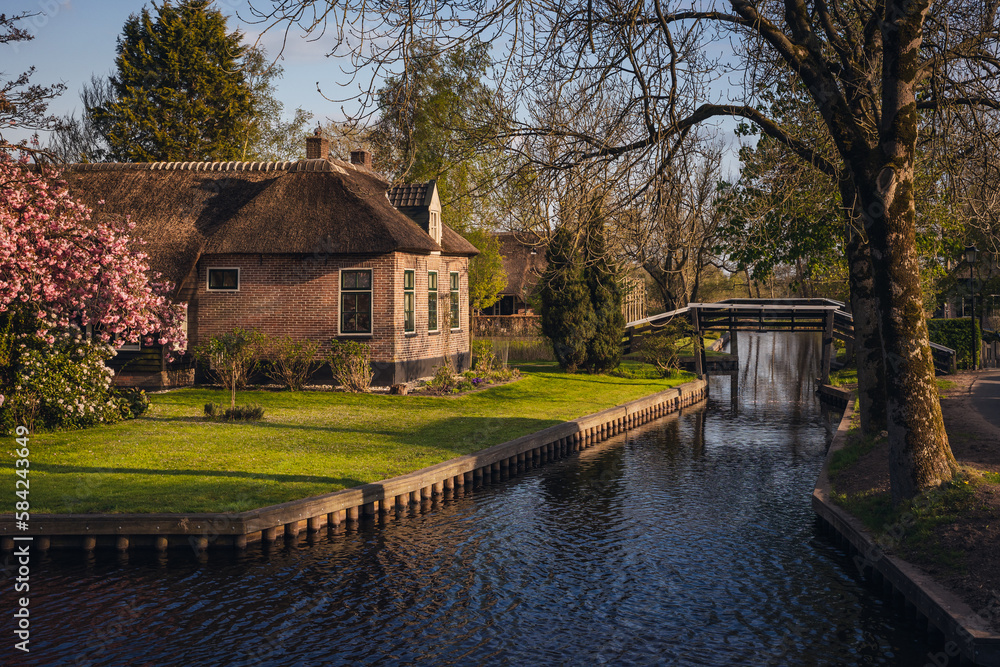 Spring in the village of Giethoorn in North Holland. This town has no roads - it travels through the canals. Spring in the village of Giethoorn in North Holland. This town has no roads - it travels through the canals.