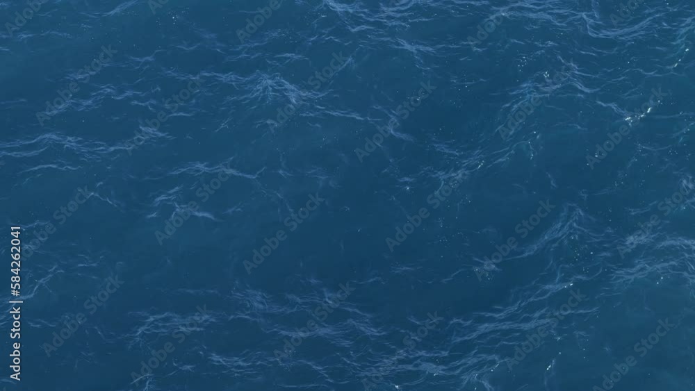 Blue sea with restless clear waves on a sunny warm summer day in a tropical country. Concept of vacation abroad. Beauty of the elements Blue sea with restless clear waves on a sunny warm summer day in a tropical country. Concept of vacation abroad. Beauty of the elements