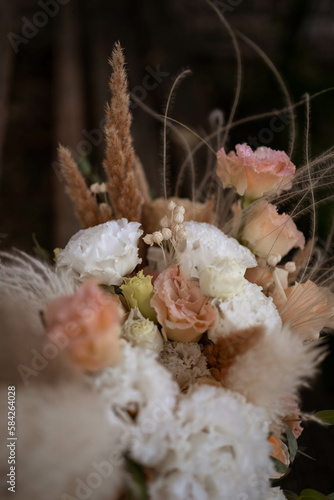 Boho bridal bouquet. White and peach wedding bouquet.