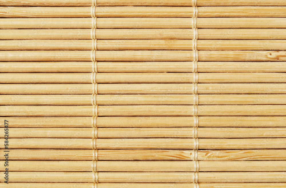 Light brown asian bamboo reed mat texture as background Light brown asian bamboo reed mat texture as background