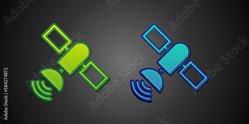 Green and blue Satellite icon isolated on black background. Vector