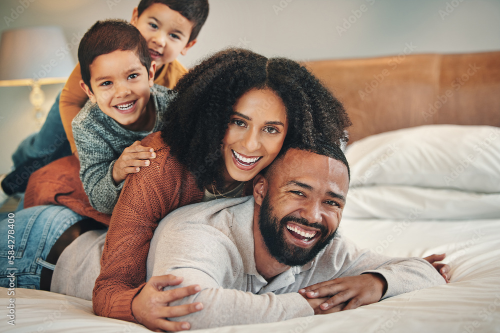 Laughing, family and portrait smile on bed in bedroom, bonding and care in home. Love, comedy and happy mother, comic father and funny children playing, having fun and enjoying quality time together.