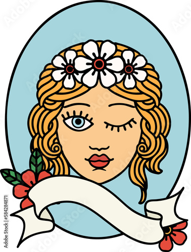 tattoo with banner of a maiden with crown of flowers winking