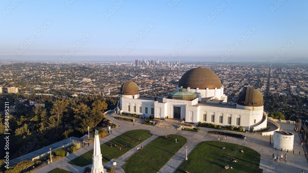 areal view of Griffith observatory with city of Los Angeles in background