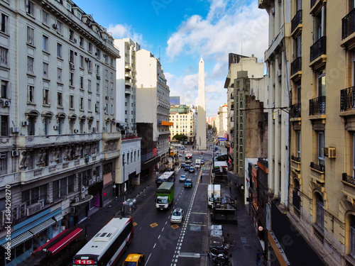 traffic on Corrientes avenue in the morning and the obelisk