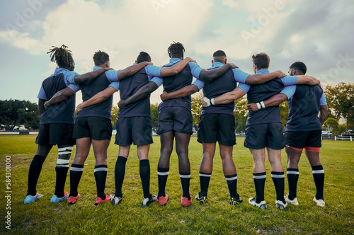 Back view, men or rugby team in stadium with support, unity or pride ready for a sports game together. Fitness, solidarity or proud players in line for match, workout or exercise on training field photo