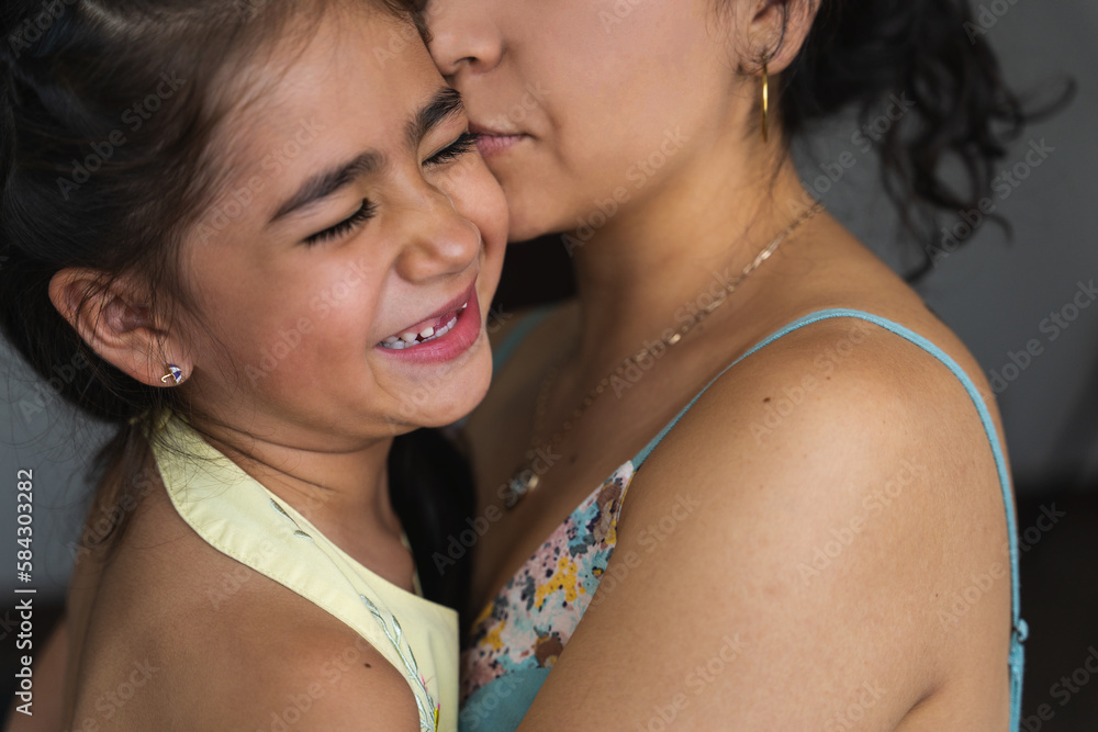close up portrait of a mother and her super cute little girl close up portrait of a mother and her super cute little girl