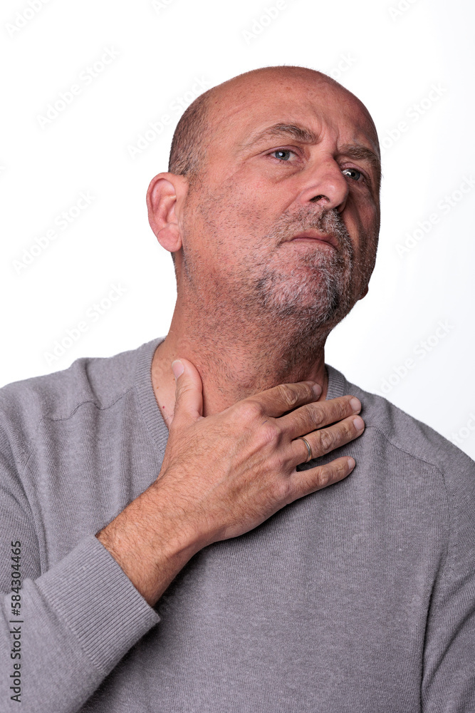 Close up headshot confident serious concentrated man over 50 looking at camera studio portrait, isolated on white studio background Close up headshot confident serious concentrated man over 50 looking at camera studio portrait, isolated on white studio background