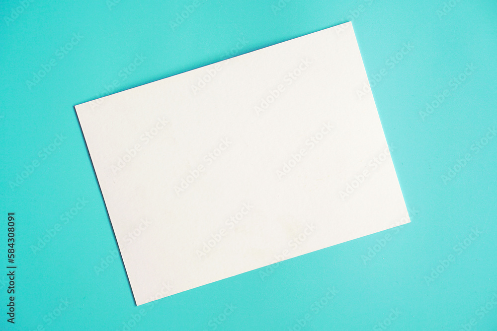blank note paper on blue background blank note paper on blue background