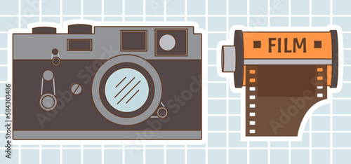 Old fashioned film photo camera and film roll cassette. Back to 90s. Nostalgia for 1990s element. Retro style.