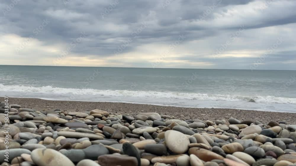 Scenic view of the sea against the background of a cloudy sky, storm on the sea, the sea in autumn or evening in cloudy weather Scenic view of the sea against the background of a cloudy sky, storm on the sea, the sea in autumn or evening in cloudy weather
