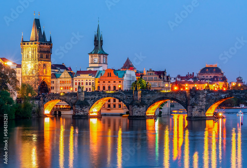 Fotografija Prague medieval architecture and Charles bridge over Vltava river at night, Czec