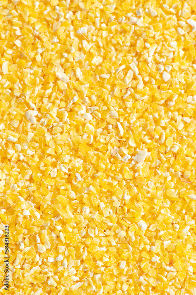 Texture of corn grits close-up. Directly above Texture of corn grits close-up. Directly above