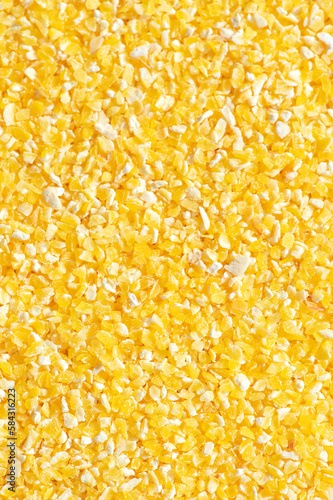 Texture of corn grits close-up. Directly above