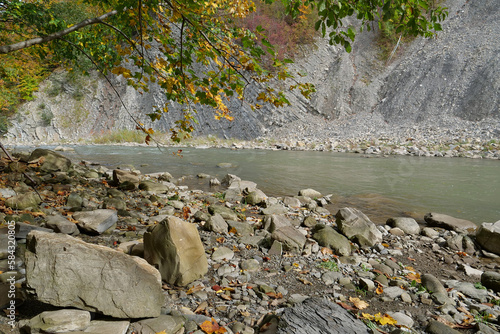 Beautiful mountain river with rapid current. Prut river and mountain folds photo