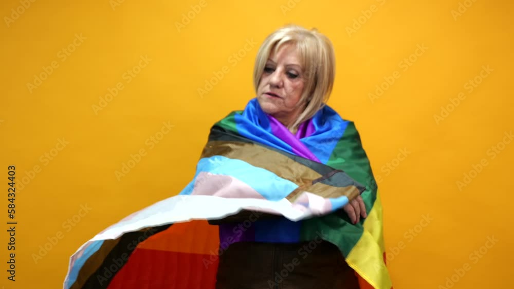 Senior woman with lgbt flag Senior woman with lgbt flag