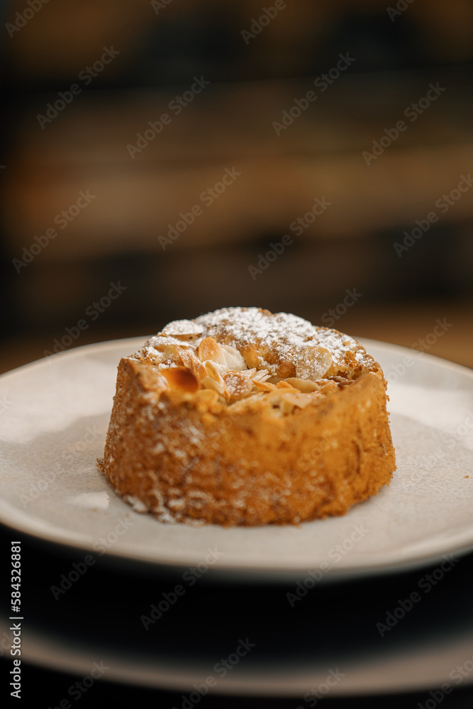 Close-up, bakery - delicious bun - cake on a rotating surface