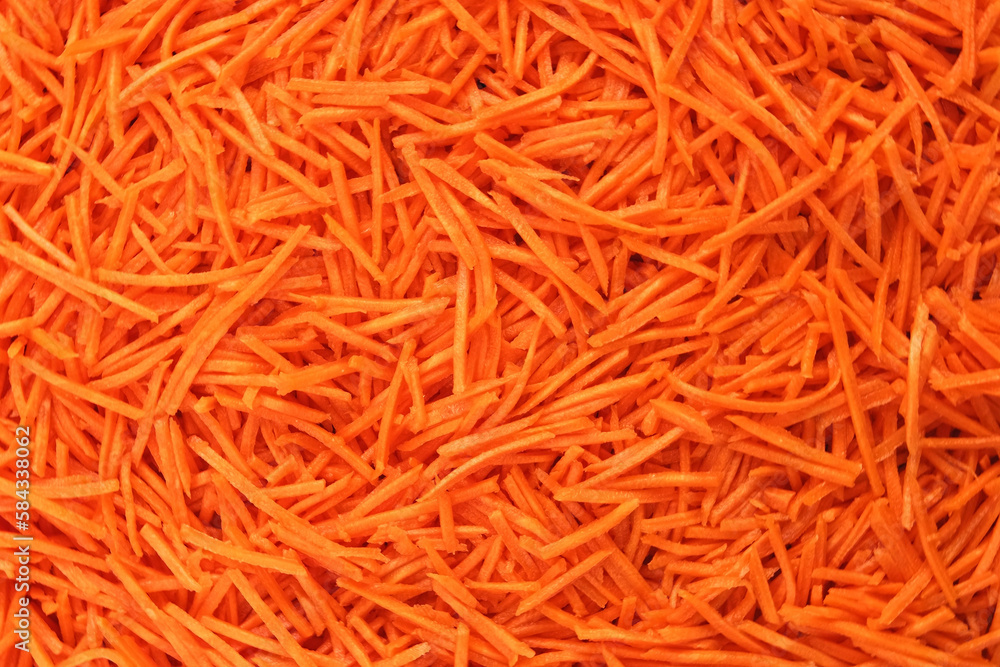 Grated Carrots Background is Spinning. Fresh Juicy Chopped Carrots. Food Orange Color Backdrop. Shredded Carrot Abundance is Rotating. Crushed, Cut Vegetables for Soup, Garnish, Salad. Healthy Eating Grated Carrots Background is Spinning. Fresh Juicy Chopped Carrots. Food Orange Color Backdrop. Shredded Carrot Abundance is Rotating. Crushed, Cut Vegetables for Soup, Garnish, Salad. Healthy Eating