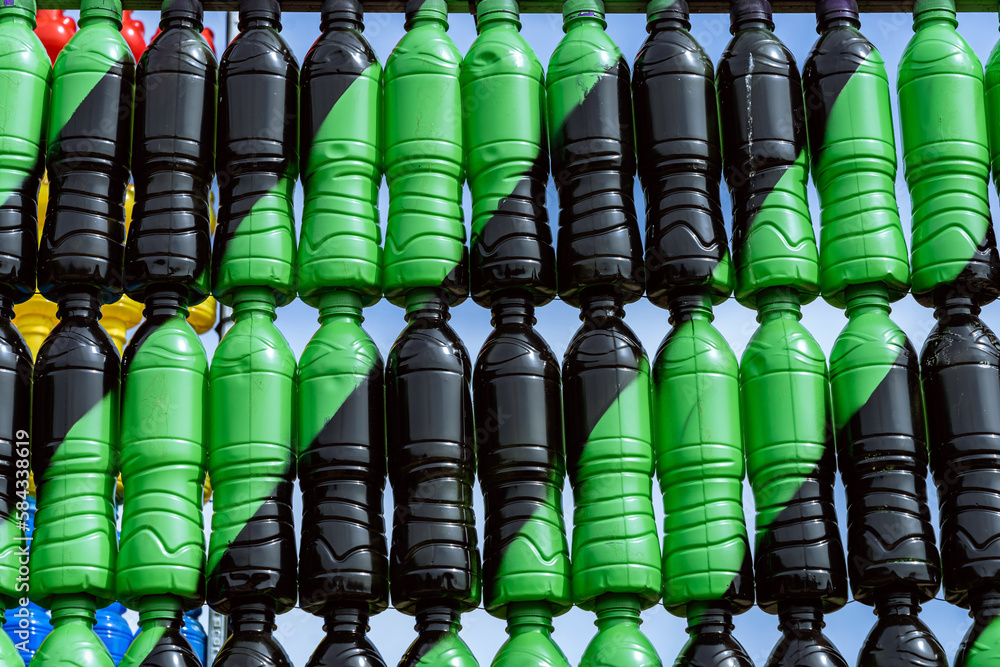 Beautiful wall made of multi colored recycled plastic bottles..Bottle