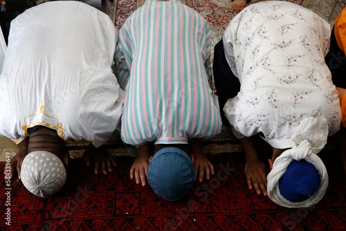 Naqshbandi sufi muslims praying in Saint-Ouen, France. photo