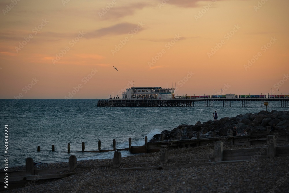 Twilight moment at the  worthing pier of the seaside city of Worthing in the UK