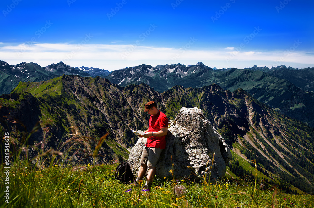 Fototapeta premium Hiker in the mountains, Allgäu Alps, Oberstdorf, Bavaria, Germany.