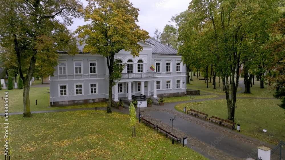 Aerial view of the Wagner Palace with a beautiful park against a cloudy sky in Lithuania Aerial view of the Wagner Palace with a beautiful park against a cloudy sky in Lithuania