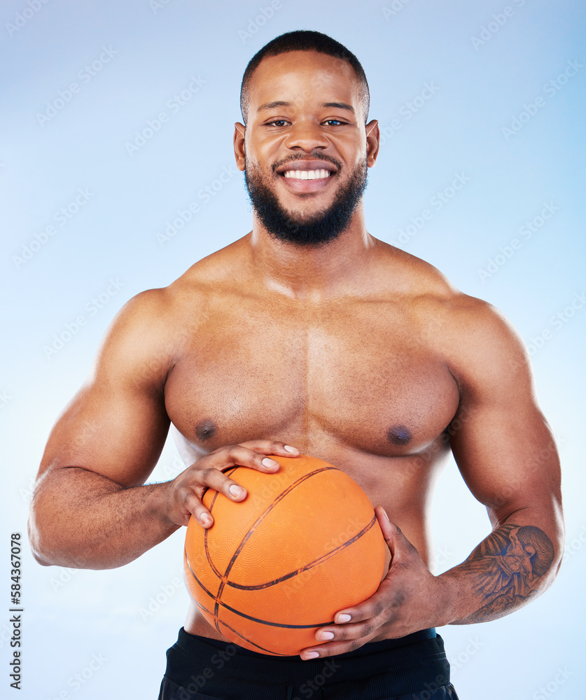 Basketball player, black man and studio portrait with smile, shirtless or happy for sports by blue background. Young fitness expert, body wellness or ball in hands for development, sport and games Basketball player, black man and studio portrait with smile, shirtless or happy for sports by blue background. Young fitness expert, body wellness or ball in hands for development, sport and games