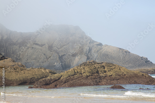 Obraz na płótnie Sea, Cliffs and Rock Formation With Mist at Odeceixe Beach; Algarve; Portugal w salonie