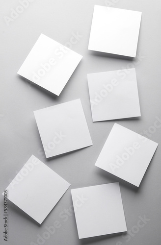 Wallpaper Mural White empty square memo sheets of paper on gray background. Template for design. Torontodigital.ca
