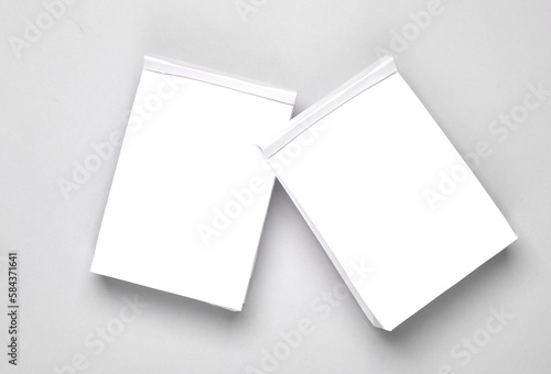 White paper lunch bags mockup on gray background