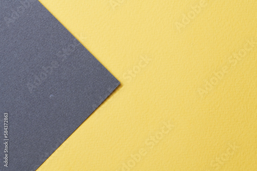 Rough kraft paper background, paper texture blue yellow colors. Mockup with copy space for text