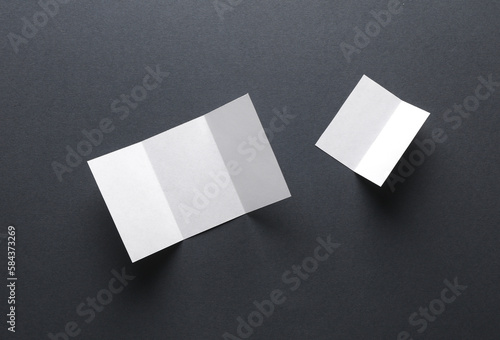 White mock up paper brochures on gray background © splitov27