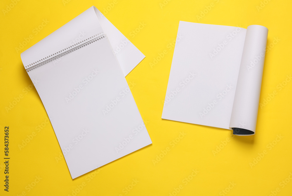 Sketchbook and notebook or magazine mockup with white pages on yellow background. Template for design Sketchbook and notebook or magazine mockup with white pages on yellow background. Template for design