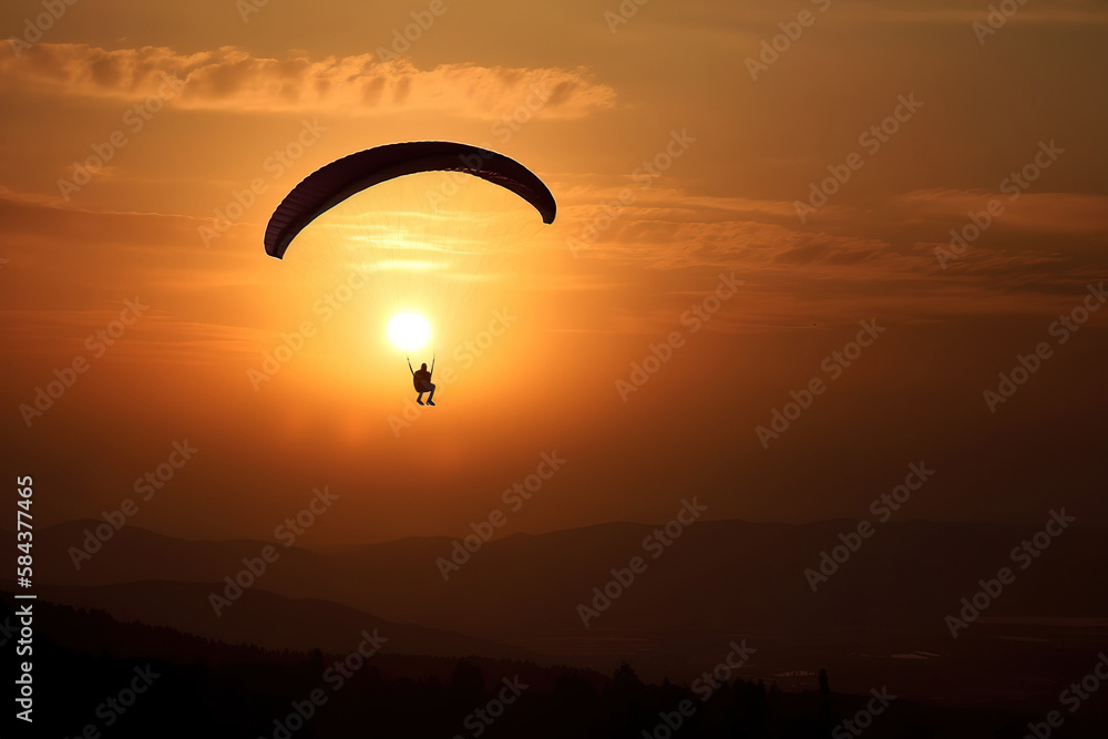 Parapente volando con un fondo de puesta de sol y montañas IA generative Parapente volando con un fondo de puesta de sol y montañas IA generative